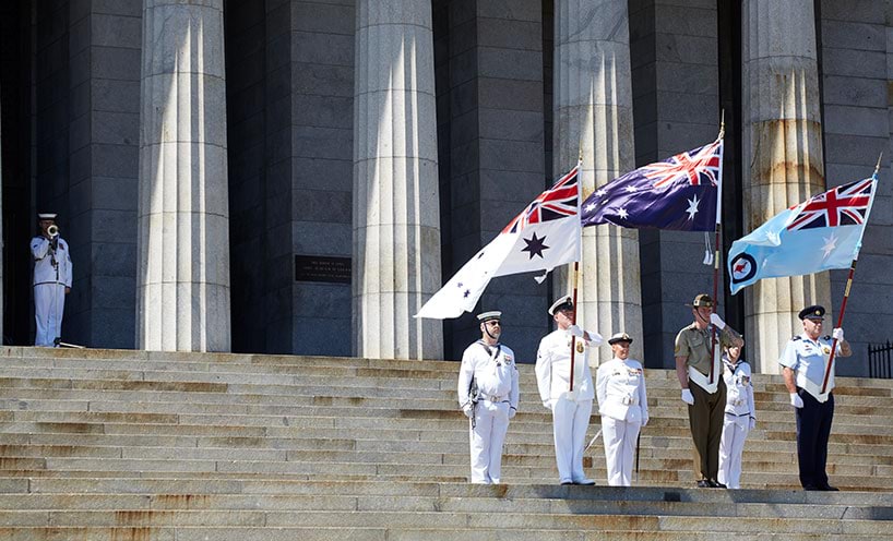 Tri-service flag party on the steps of the Shrine