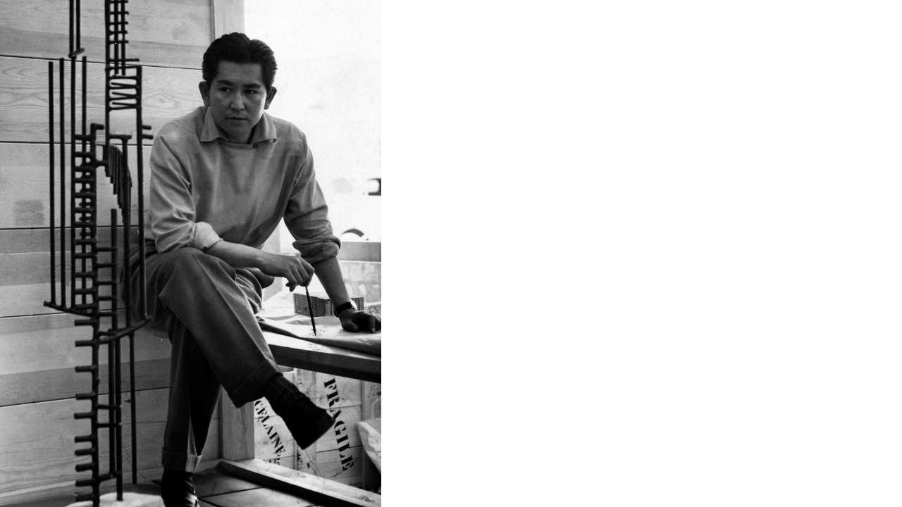 Black and white portrait of Yoji Kasajima in studio.