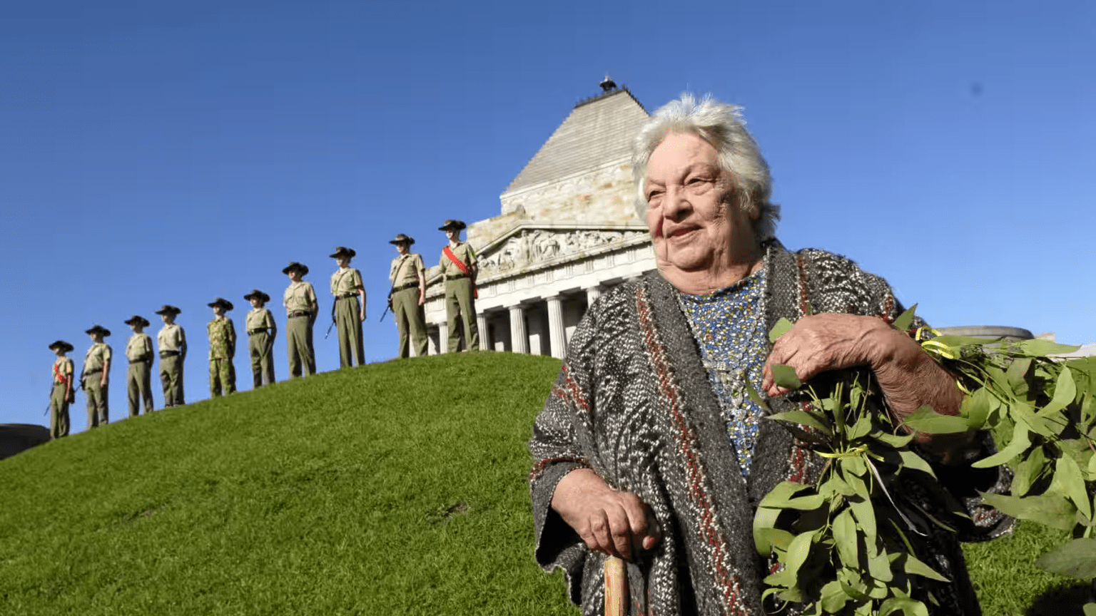 Aunty Dot Peters holding a wreath in from the of the Shrine of Remembrance at the first VARS at the Shrine in 2006.