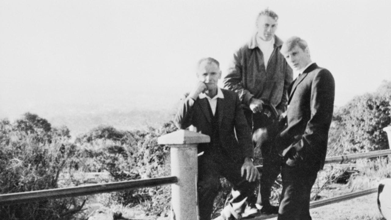 Black and white image of Errol Wayne Noack with his father Walter Noack and an unidentified friend in Port Lincoln the day before he departed for Vietnam